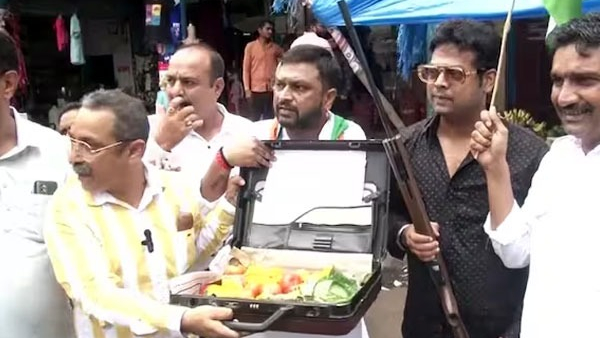  Youth brought tomatoes carrying briefcase, gun to protest against price rise