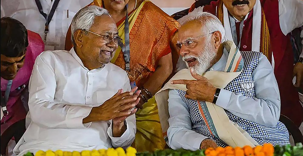 நிதிஷ் குமார் (JDU), மோடி (BJP)